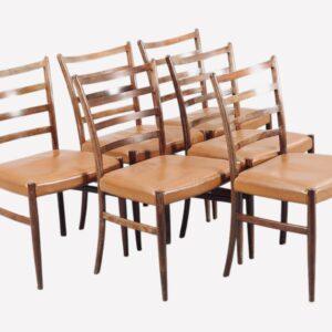 Série de 6 chaises danoises des années 1960 en palissandre et cuir fauve