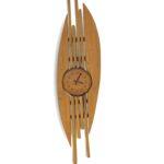 Pendule murale sculpture en teck massif design organique vintage des annees 1970